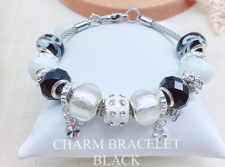 Real silver charm on sale bracelet